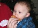 Ace's First Bite Of Pizza