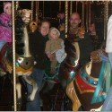 Momma, Dad, and Ace on the Carousel Momma, Dad, and Ace on the Carousel