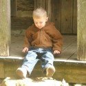 Sitting On The Front Porch Of An 1800's Cabin Sitting On The Front Porch Of An 1800's Cabin