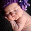 Valerie With A Purple Flower Hat