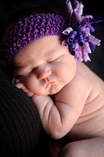 Valerie With A Purple Flower Hat